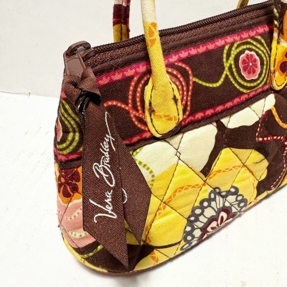 Vera Bradley mini top handle bag in the 